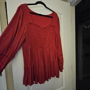 Long sleeve red peplum top from Torrid.